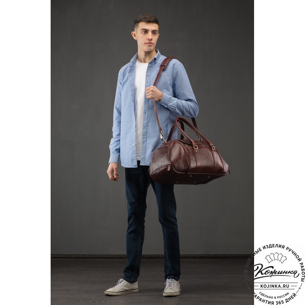 Кожаная дорожно-спортивная сумка "Дональд" (синий антик)